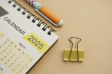 2025 year calendar on office deskの写真素材