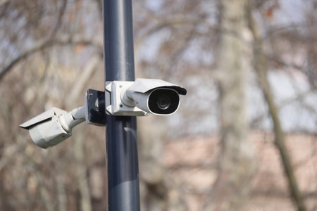 Security cameras mounted on a pole in an urban setting