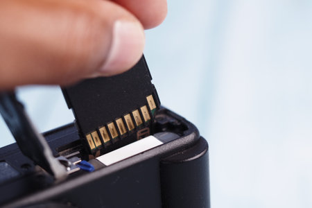 Inserting memory card into electronic device for data storage