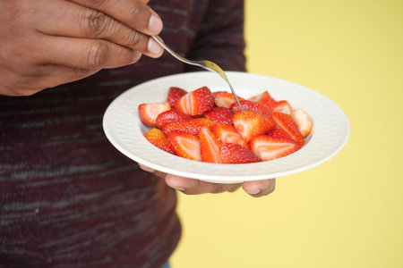 Fresh strawberries served on a plate ready to be enjoyed