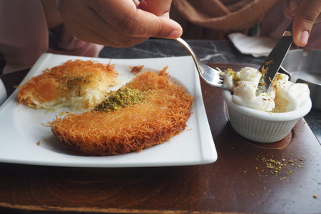 Turkish dessert kunefe, kunafa, kadayif with pistachio