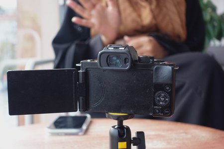 Camera setup for content creation in a cozy indoor spaceの写真素材