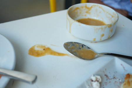 Dessert remnants on a table after a casual meal with friendsの写真素材