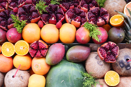 Fresh fruits displayed at a local market during daytimeの写真素材