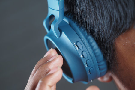 Adjusting blue headphones for an optimal listening experience