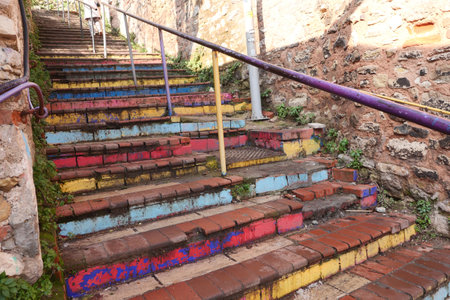 Colorful staircase in a historic part of town on a sunny dayの写真素材