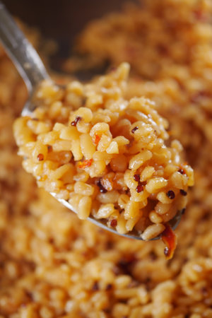 Delicious bowl of spiced rice served at dinner gatheringの写真素材