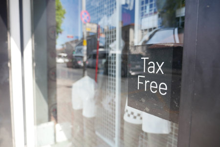 Shop offers tax-free shopping in a busy urban area during the dayの写真素材