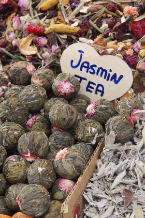 Jasmin tea displayed at a vibrant herbal market in autumnの写真素材