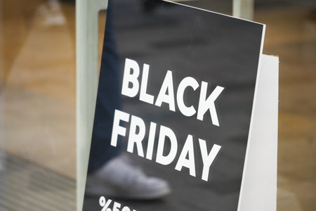 Retail store displays Black Friday sale sign in shopping districtの写真素材