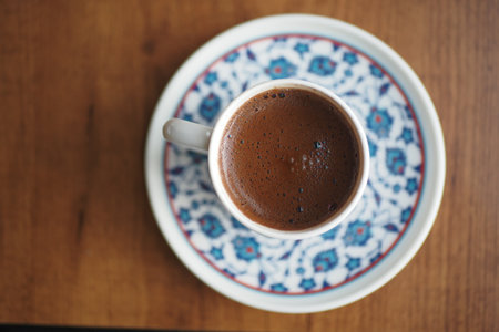 Enjoying a cup of turkish coffee in a cozy settingの写真素材