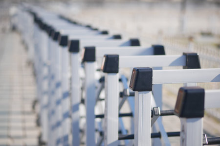 Close-Up of Track Hurdles Arranged in Order for Outdoor Trainingの写真素材