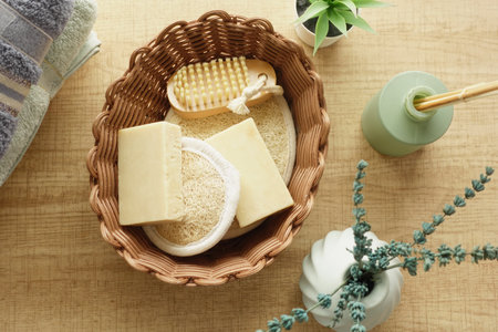 Natural skincare products arranged in a wooden basket on a tableの写真素材
