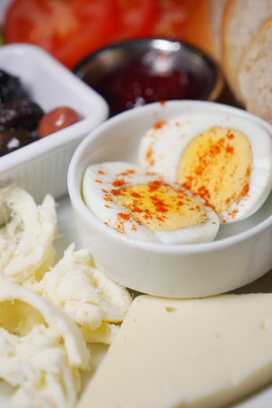 Delicious breakfast platter with eggs and fresh ingredientsの写真素材