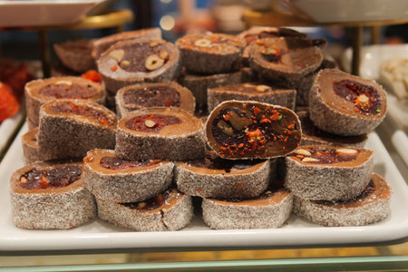 Charming display of Turkish delight sweet rolls in a shopの写真素材