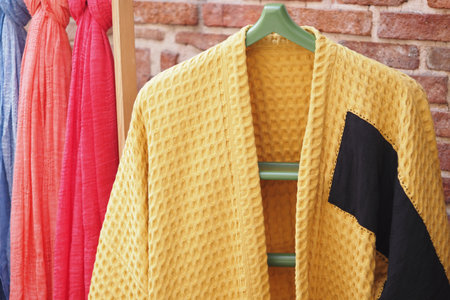Colorful textiles displayed in a crafting studio with modern decorの写真素材