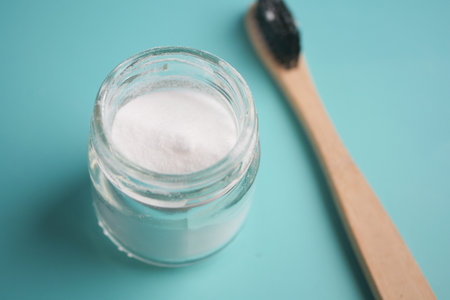 Natural tooth whitening with baking soda and bamboo toothbrushの写真素材
