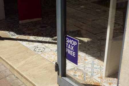 Sign indicating tax-free shopping outside a local store