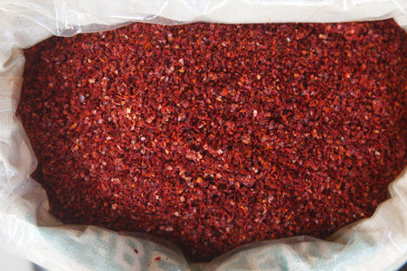 Spices displayed in a burlap sack at a market stand in summer