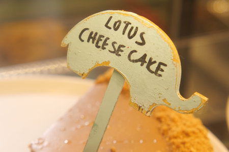 Lotus cheesecake displayed at a dessert counter in a bakery