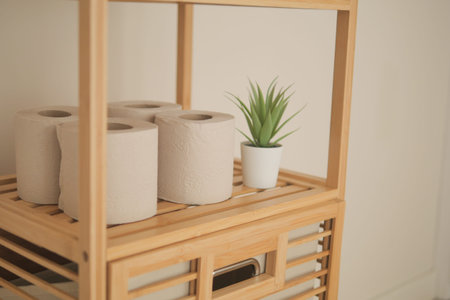 Wooden Shelf Holding natural bamboo Toilet Paper Rolls