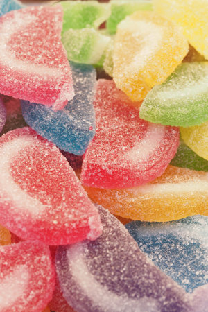 Colorful gummy candies piled together in a vibrant displayの写真素材