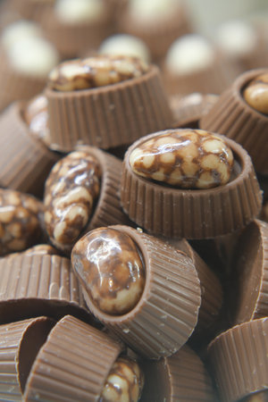 Delicious assorted chocolates displayed at a local confectionery shopの写真素材