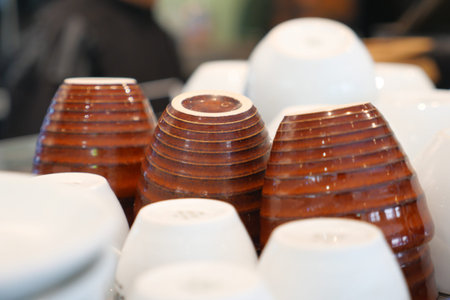 Colorful and stacked coffee cups at a cafe