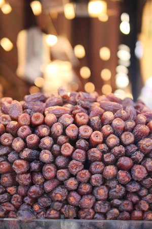 Freshly dried dates displayed in a market stallの写真素材