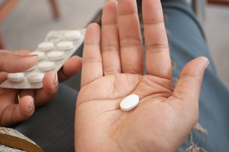 Person taking medication in a relaxed setting