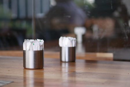 Sugar packets on a cafe tableの写真素材