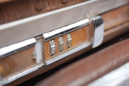 Worn antique lock on vintage suitcase