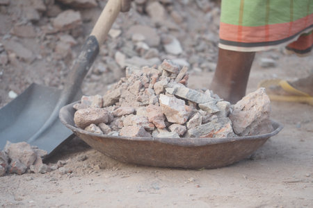 Collecting rubble for busy site workの写真素材