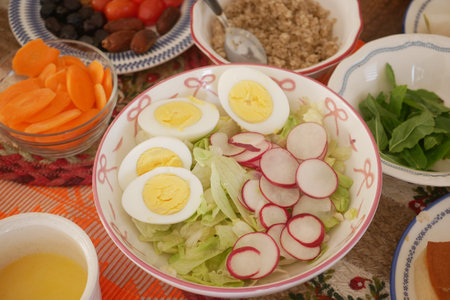 Vibrant salad with eggs and fresh veggiesの写真素材