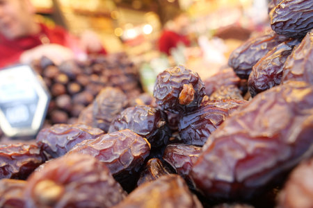 Fresh dates displayed at a local market in the afternoonの写真素材