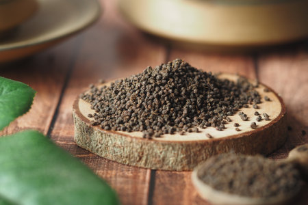 natural tea leaf on wooden tableの写真素材