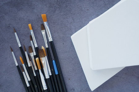 Brushes and canvases ready for painting sessionの写真素材