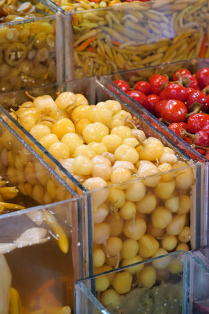 Fresh pickles selling in a market displayの写真素材