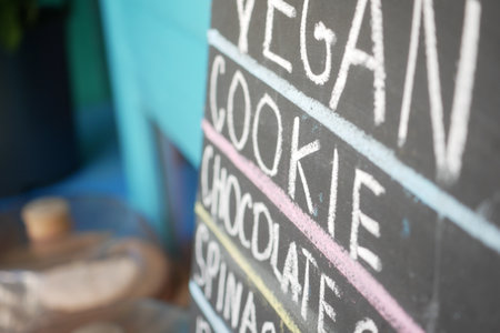 Delicious vegan chocolate cookie displayed in cafeの写真素材