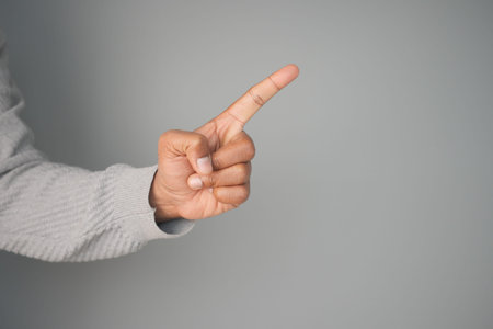 Finger pointing gesture indicating a key idea or suggestionの写真素材