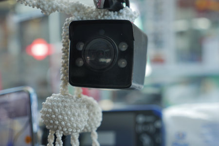 Surveillance camera mounted in a carの写真素材