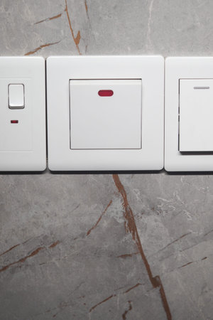 Modern wall switches and outlets in a stylish interior