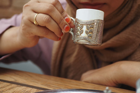 Enjoying turkish coffee in a decorative cupの写真素材
