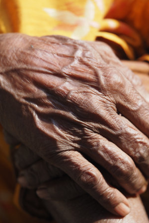 Elderly hands showing lifes stories and experiencesの写真素材