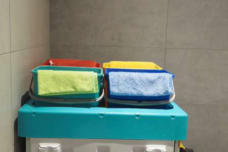 Colorful towels arranged neatly in a laundry areaの写真素材