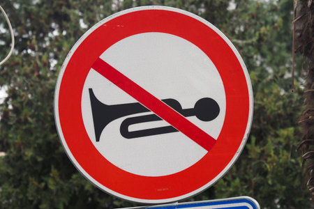 No honking sign displayed in urban areaの写真素材