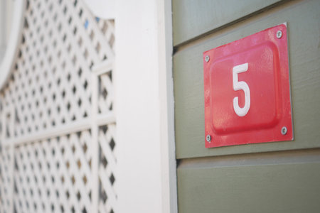 House number five on a quiet neighborhood street