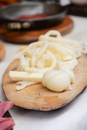 Freshly prepared ingredients on a wooden board for cooking