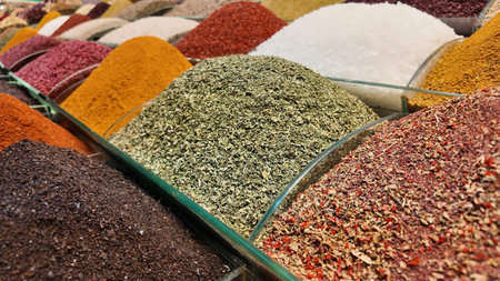 Vibrant spices display at a market stall in the afternoon