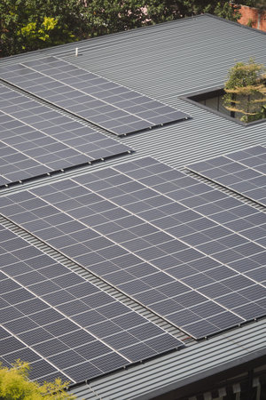Solar panels cover residential rooftop for renewable energy